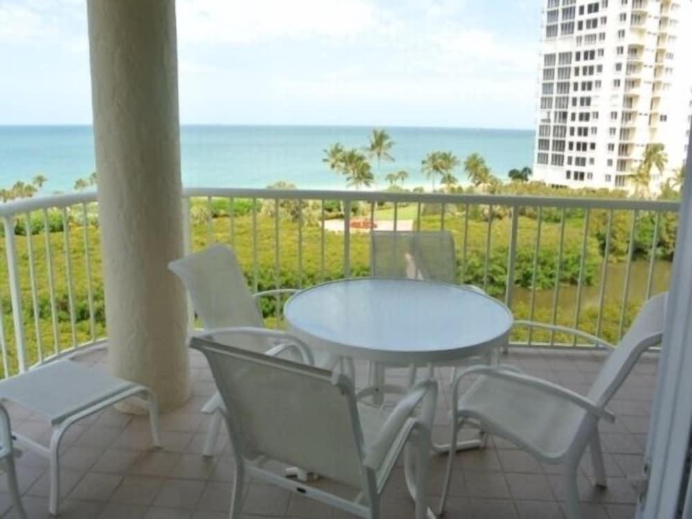 Deluxe Beachfront Condo Located in Prestigious Resort with Pool and Hot Tub by RedAwning - Balcony