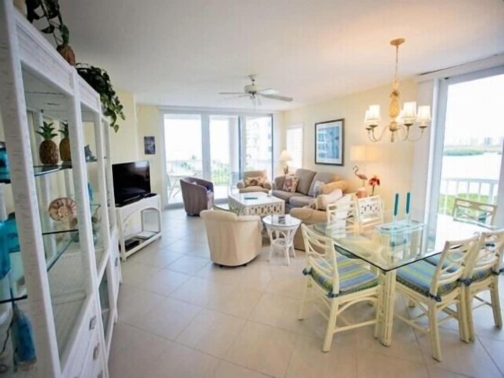 Oceanfront Condo, Short Walk to the Beach with Olympic-Size Pool by RedAwning - Living Room