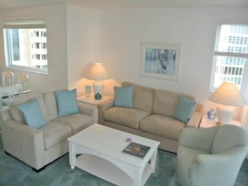 Deluxe Beachfront Condo Located in Prestigious Resort with Pool and Hot Tub by RedAwning - Featured Image