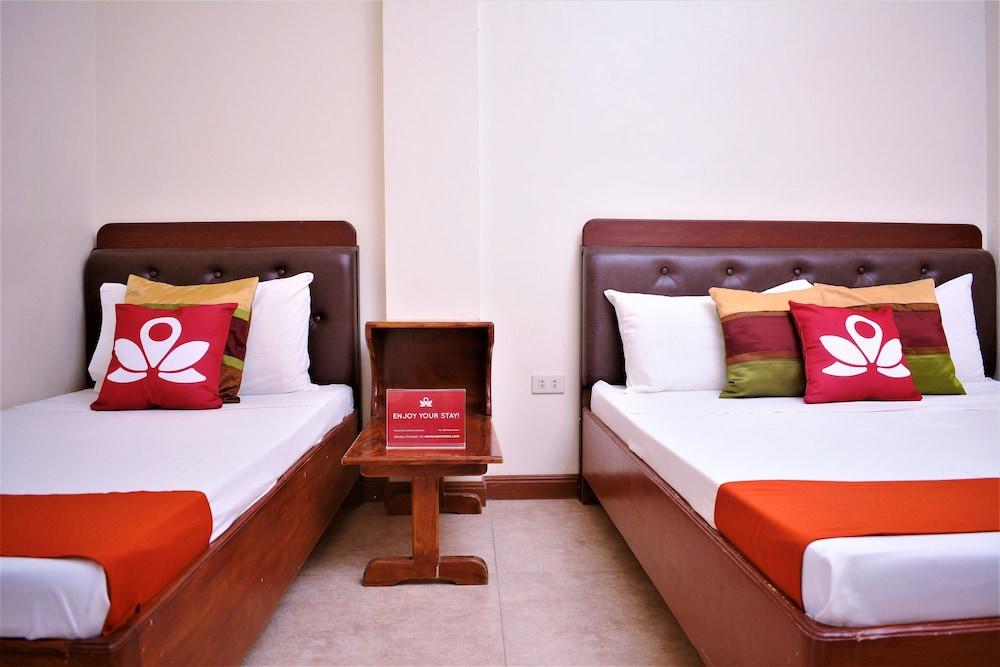 ZEN Rooms Jilian Tourist Inn Palawan - Featured Image